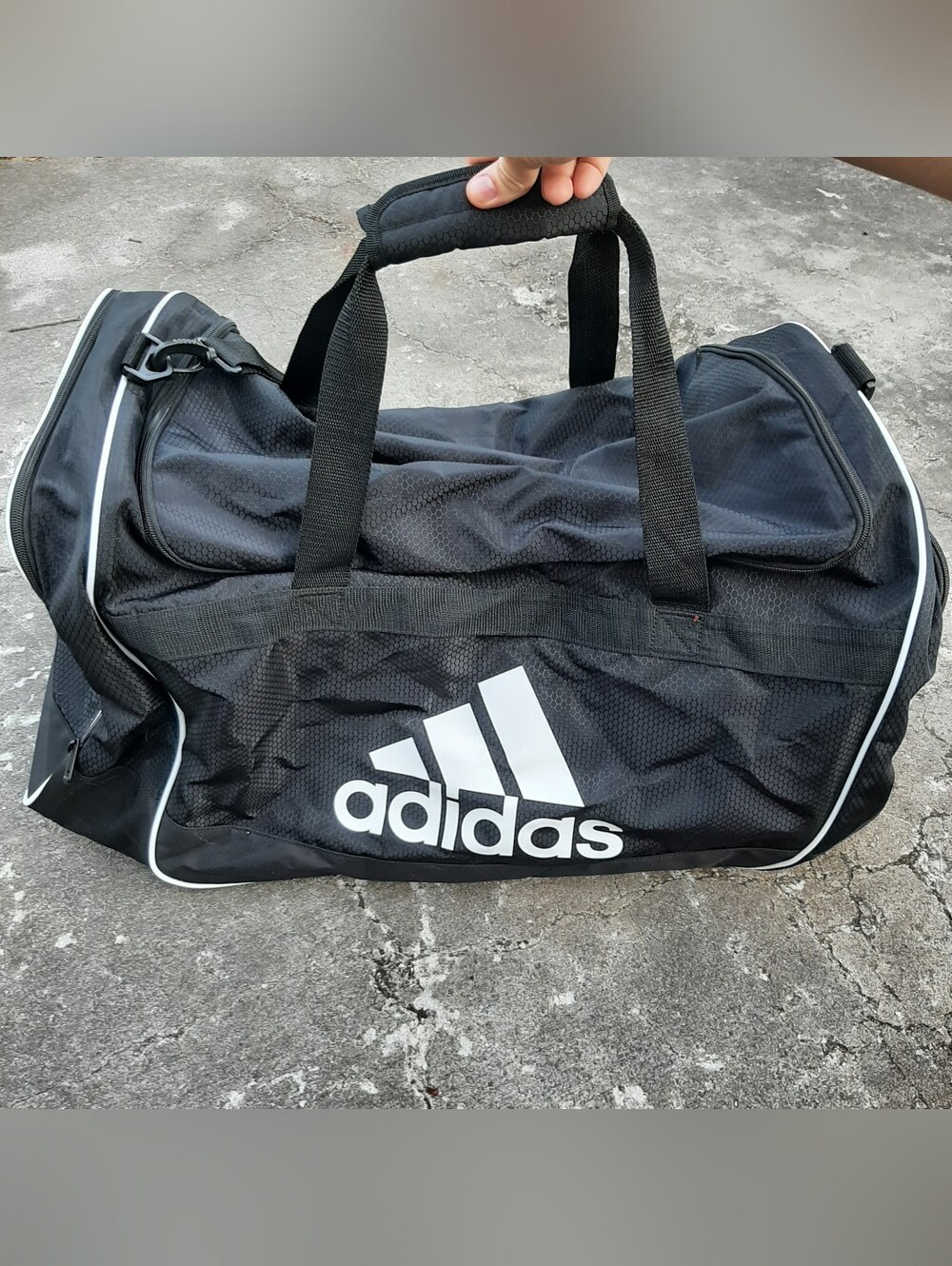 Black Adidas Defender duffel bag